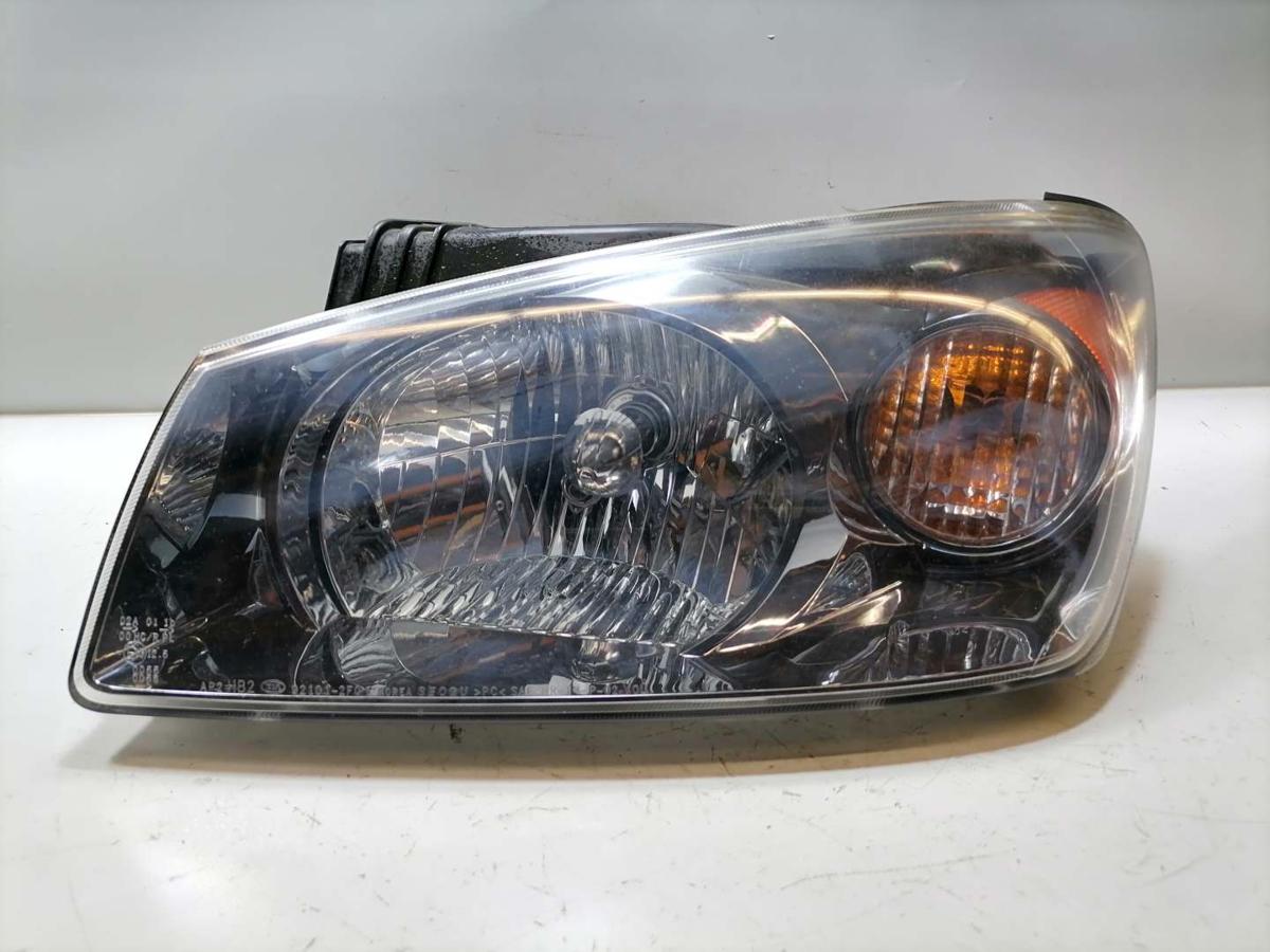 Kia Cerato original Scheinwerfer vorn links Halogen Bj.2004